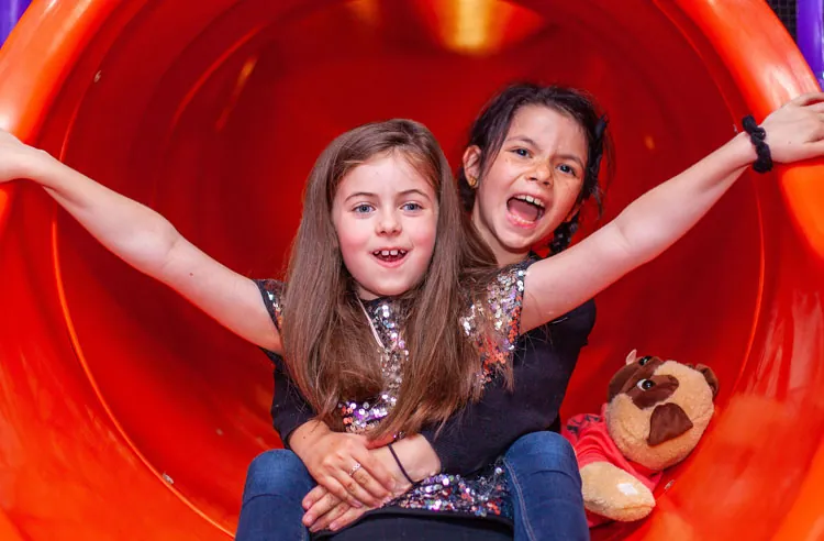 Kids playing on the soft play frame at Fun Street Glasgow