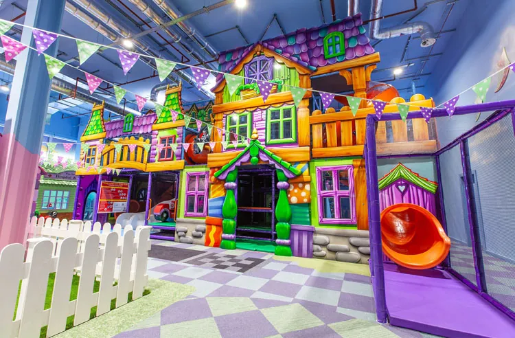 Painted playhouses on the street at Fun Street