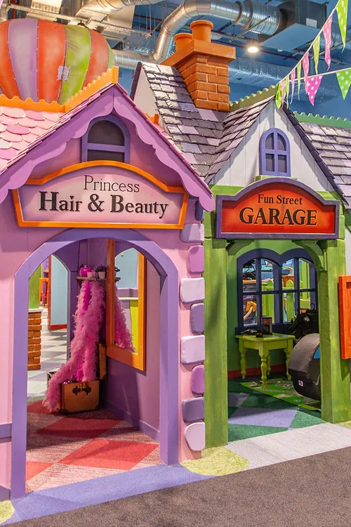 The big painted play houses on the storybook street at Fun Street soft play, Glasgow
