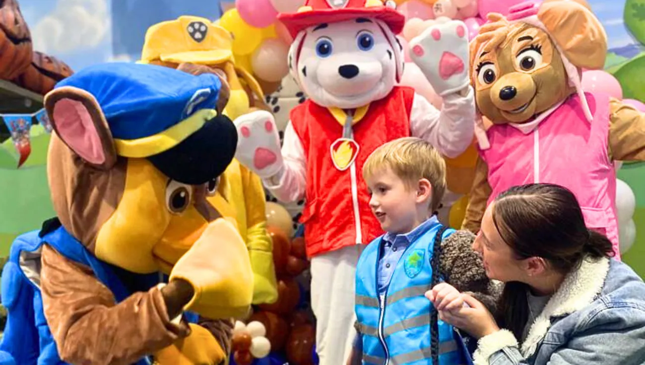 Children meeting costumed characters at a themed birthday party at Fun Street soft play in Glasgow