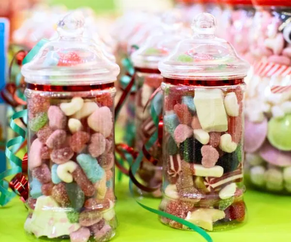 Glass jars packed with colourful pick and mix sweets, part of the treats at Fun Street events