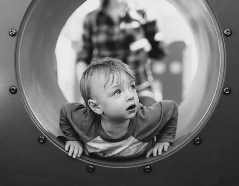 A child on the play frame at Fun Street
