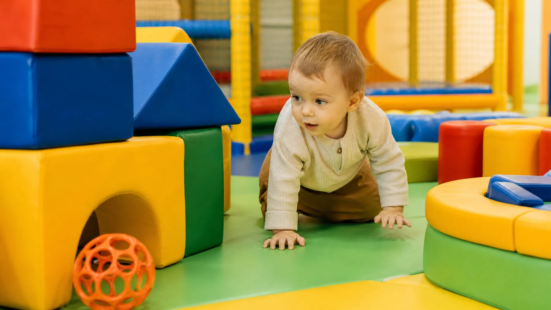 Toddler exploring the toddler zone at Fun Street soft play Glasgow